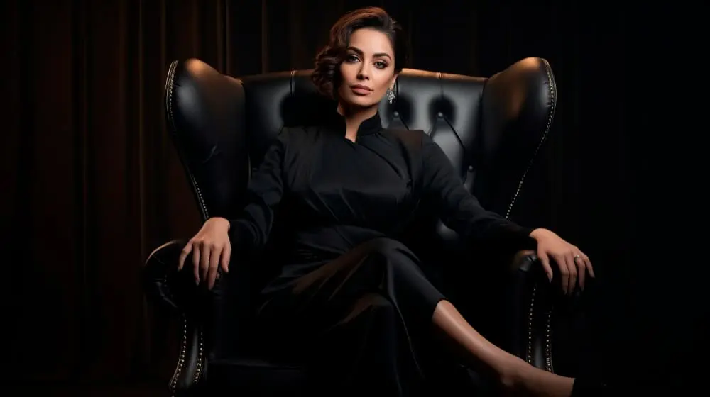 Elegant woman at a rooftop bar overlooking Marina Bay Singapore at night